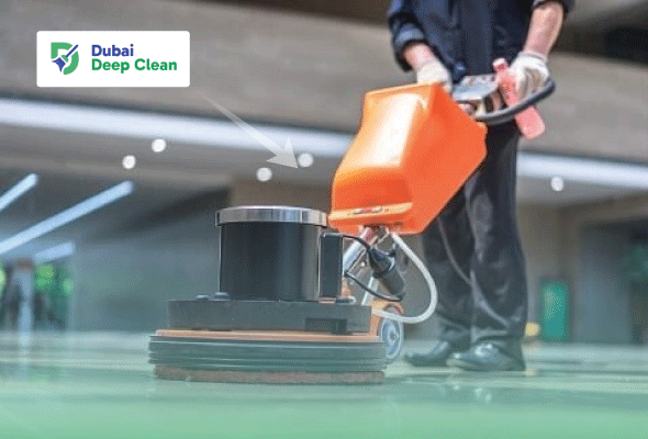 A professional cleaner operating an industrial floor scrubbing machine to deep clean and polish a large commercial marble floor.